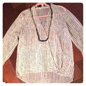 Black and off white blouse